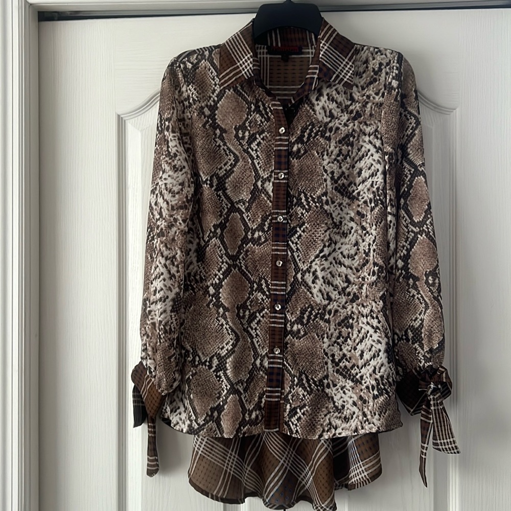 Mishca long sleeve button down shirt, new.